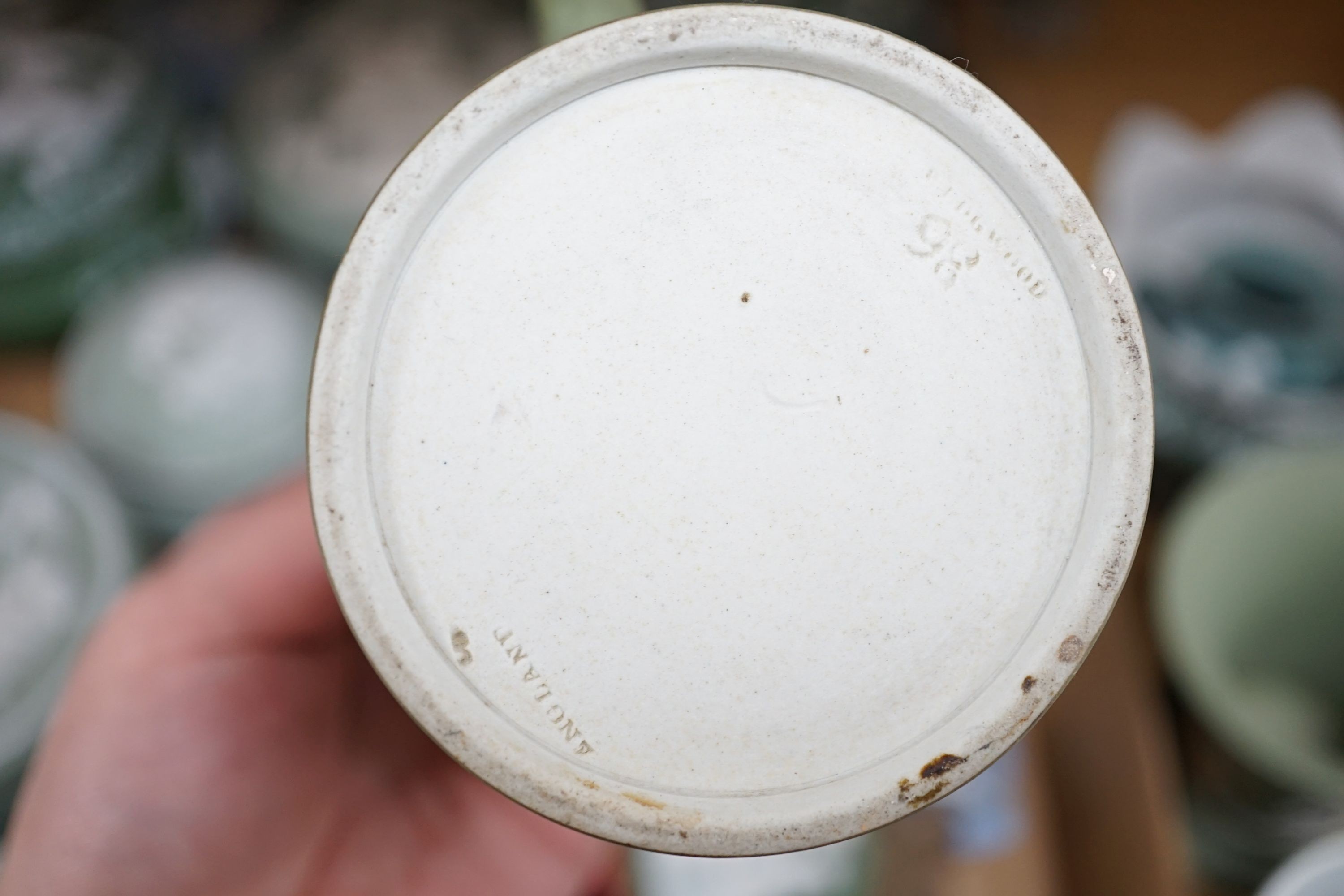 A collection of French bisque boxes and vases.